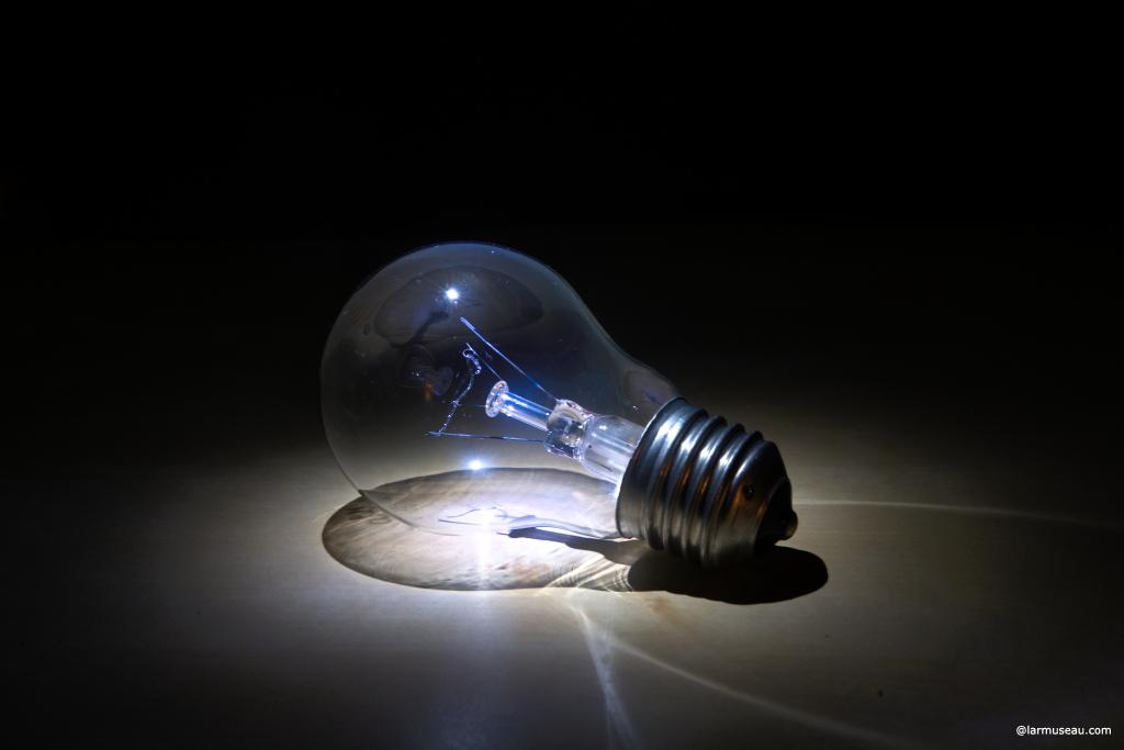 Light·bulb noun \ˈlīt-ˌbəlb\ Definition of LIGHTBULB :  an electric lamp: as a :  one in which a filament gives off light when heated to incandescence by an electric current —called also incandescent, incandescent lamp 