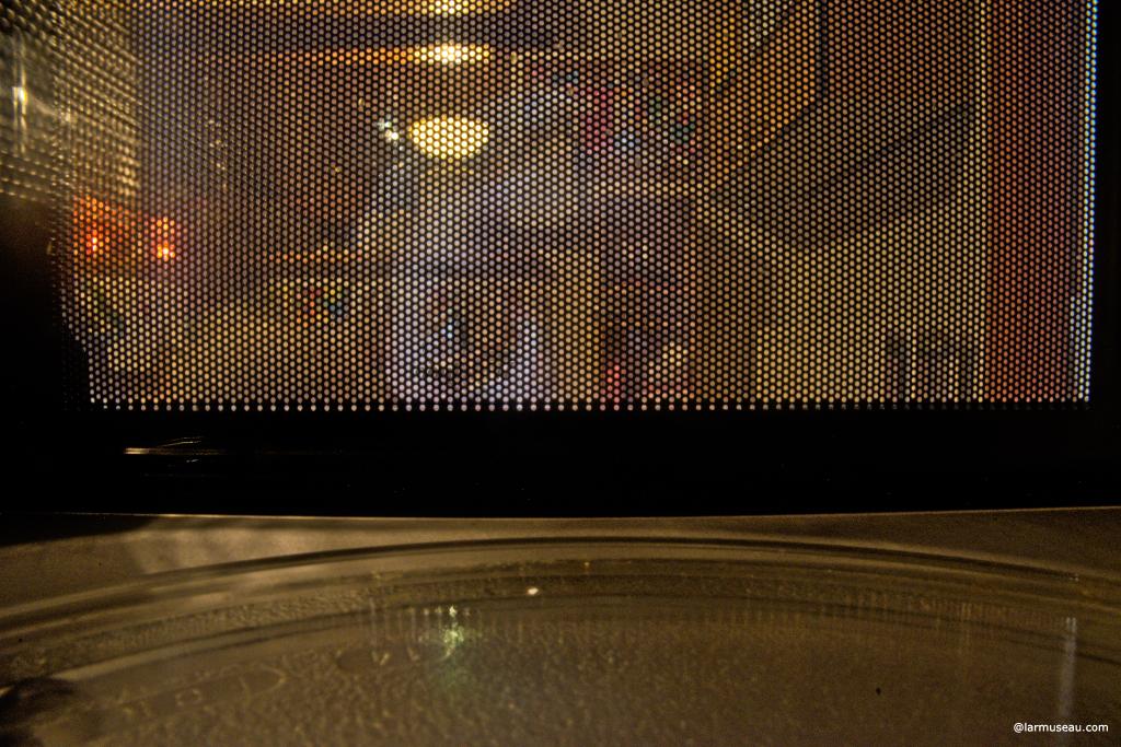 microwave oven noun : an oven in which food is cooked or heated quickly by very short waves of electromagnetic energy : an oven in which food is cooked by the heat produced by the absorption of microwave energy by water molecules in the food microwave oven noun (Concise Encyclopedia)