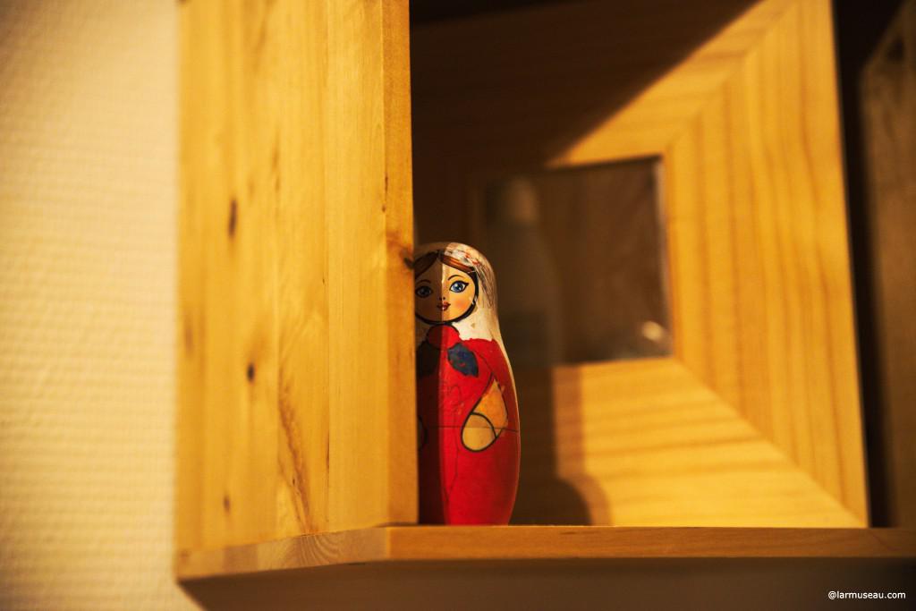 babushka \bə-ˈbüsh-kə, -ˈbu̇sh-,  a :  a usually triangularly folded kerchief for the head :  an elderly Russian woman 